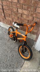 MaxSold Auction: Supercycle Kids’ Bike – Orange (12”) - Clarington (Ontario, Canada) SELLER MANAGED Moving Online Auction - Cornish Drive