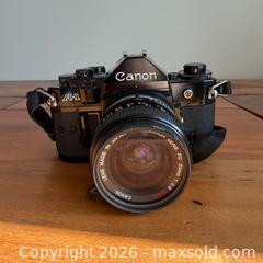 MaxSold Auction: Canon A-1 SLR 35mm Film Camera With Extra Lens & Accessories - Toronto (Ontario, Canada) SELLER MANAGED Reseller Online Auction -  Crouse Road (STORAGE)