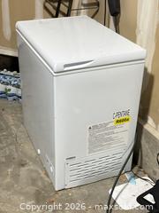 MaxSold Auction: White Chest Freezer with Interior Light and Removable Basket - Erie (Colorado, USA) SELLER MANAGED Moving Online Auction - Madison Drive