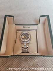 MaxSold Auction: Bulova Two-Tone Gold Tone Quartz Wristwatch 40–44mm - East Bridgewater (Massachusetts, USA) SELLER MANAGED Downsizing Online Auction - Laurel Street