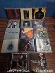 MaxSold Auction: 14 Audio CDs in Jewel Cases - Calgary (Alberta, Canada) SELLER MANAGED Estate Sale Online Auction - 59 Avenue South East