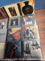 MaxSold Auction: 14 Audio CDs in Jewel Cases - Calgary (Alberta, Canada) SELLER MANAGED Estate Sale Online Auction - 59 Avenue South East