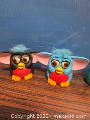 MaxSold Auction: Lot of 4 Furby Collectibles (1990s) - Calgary (Alberta, Canada) SELLER MANAGED Estate Sale Online Auction - 59 Avenue South East