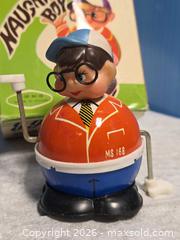 MaxSold Auction: Naughty Boy Wind-Up Toy - Calgary (Alberta, Canada) SELLER MANAGED Estate Sale Online Auction - 59 Avenue South East
