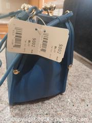 MaxSold Auction: Coach Blue Leather Mini Crossbody Bag - Las Vegas (Nevada, USA) PARTNER MANAGED Estate Sale Online Auction - Argent Star Court