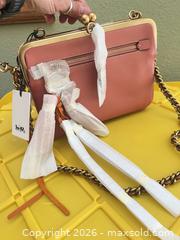 MaxSold Auction: Coach Coral / Peach Leather Crossbody with Gold-tone Hardware - Las Vegas (Nevada, USA) PARTNER MANAGED Estate Sale Online Auction - Argent Star Court