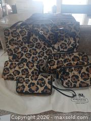 MaxSold Auction: Coach Leopard Print Leather Tote with Matching Small Bags & Wallet - Las Vegas (Nevada, USA) PARTNER MANAGED Estate Sale Online Auction - Argent Star Court