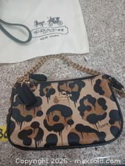 MaxSold Auction: Coach Leopard Print Leather Tote with Matching Small Bags & Wallet - Las Vegas (Nevada, USA) PARTNER MANAGED Estate Sale Online Auction - Argent Star Court