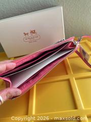 MaxSold Auction: Coach Pink Leather Wristlet with Silver Hardware - Las Vegas (Nevada, USA) PARTNER MANAGED Estate Sale Online Auction - Argent Star Court