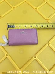 MaxSold Auction: Coach Purple Textured Leather Zip Wallet with Double Zipper - Las Vegas (Nevada, USA) PARTNER MANAGED Estate Sale Online Auction - Argent Star Court