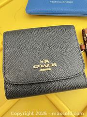 MaxSold Auction: Coach & Rebecca Minkoff Genuine Leather Wallets & Pouches - Las Vegas (Nevada, USA) PARTNER MANAGED Estate Sale Online Auction - Argent Star Court