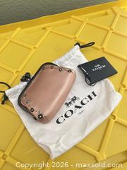 MaxSold Auction: Coach Rose Gold Leather Small Coin Purse with Floral Clasp - Las Vegas (Nevada, USA) PARTNER MANAGED Estate Sale Online Auction - Argent Star Court