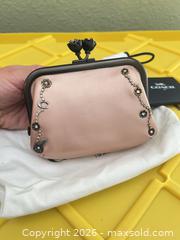 MaxSold Auction: Coach Rose Gold Leather Small Coin Purse with Floral Clasp - Las Vegas (Nevada, USA) PARTNER MANAGED Estate Sale Online Auction - Argent Star Court