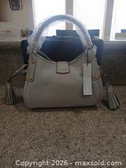 MaxSold Auction: Dooney & Bourke Ecru Leather Shoulder Bag with Logo Lock - Las Vegas (Nevada, USA) PARTNER MANAGED Estate Sale Online Auction - Argent Star Court