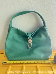 MaxSold Auction: Dooney & Bourke Green Leather Shoulder Hobo Bag - Las Vegas (Nevada, USA) PARTNER MANAGED Estate Sale Online Auction - Argent Star Court