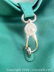 MaxSold Auction: Dooney & Bourke Green Leather Shoulder Hobo Bag - Las Vegas (Nevada, USA) PARTNER MANAGED Estate Sale Online Auction - Argent Star Court