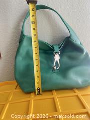 MaxSold Auction: Dooney & Bourke Green Leather Shoulder Hobo Bag - Las Vegas (Nevada, USA) PARTNER MANAGED Estate Sale Online Auction - Argent Star Court