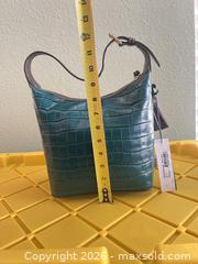 MaxSold Auction: Dooney & Bourke Green/Teal Embossed Leather Hobo Shoulder Bag - Las Vegas (Nevada, USA) PARTNER MANAGED Estate Sale Online Auction - Argent Star Court