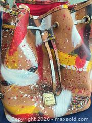 MaxSold Auction: Dooney & Bourke Multicolor Paint-Splatter Leather-Trim Bucket Bag - Las Vegas (Nevada, USA) PARTNER MANAGED Estate Sale Online Auction - Argent Star Court