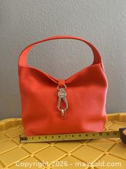 MaxSold Auction: Dooney & Bourke Orange Pebbled Leather Shoulder Bag - Las Vegas (Nevada, USA) PARTNER MANAGED Estate Sale Online Auction - Argent Star Court