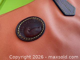 MaxSold Auction: Dooney & Bourke Orange/Coral Coated Canvas Tote Bag - Las Vegas (Nevada, USA) PARTNER MANAGED Estate Sale Online Auction - Argent Star Court