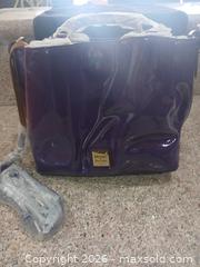 MaxSold Auction: Dooney & Bourke Purple Patent Leather Handbag - Las Vegas (Nevada, USA) PARTNER MANAGED Estate Sale Online Auction - Argent Star Court