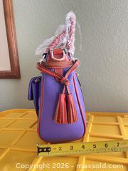 MaxSold Auction: Dooney & Bourke Purple Pebbled Leather Satchel with Tan Trim - Las Vegas (Nevada, USA) PARTNER MANAGED Estate Sale Online Auction - Argent Star Court