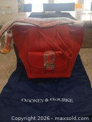 MaxSold Auction: Dooney & Bourke Red Leather Drawstring Bucket Bag - Las Vegas (Nevada, USA) PARTNER MANAGED Estate Sale Online Auction - Argent Star Court