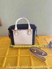 MaxSold Auction: Dooney & Bourke Small Leather Satchel (Approx. 9" x 7.5" x 4") - Las Vegas (Nevada, USA) PARTNER MANAGED Estate Sale Online Auction - Argent Star Court