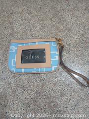 MaxSold Auction: Guess Light Blue Wristlet with Tan Trim & Gold Hardware - Las Vegas (Nevada, USA) PARTNER MANAGED Estate Sale Online Auction - Argent Star Court