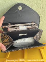 MaxSold Auction: Neiman Marcus Black & Gold Lace Overlay Clutch Crossbody - Las Vegas (Nevada, USA) PARTNER MANAGED Estate Sale Online Auction - Argent Star Court