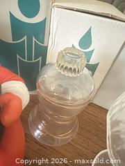 MaxSold Auction: Partylite Holiday Santa Votive Holders, Glass Chimneys & Frosted Shade - Las Vegas (Nevada, USA) PARTNER MANAGED Estate Sale Online Auction - Argent Star Court