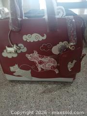 MaxSold Auction: Radley Red Leather Handbag with Dog Appliqué - Las Vegas (Nevada, USA) PARTNER MANAGED Estate Sale Online Auction - Argent Star Court