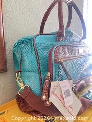 MaxSold Auction: Samantha Brown Teal Reptile-Embossed Faux Leather Weekender 18–20in - Las Vegas (Nevada, USA) PARTNER MANAGED Estate Sale Online Auction - Argent Star Court