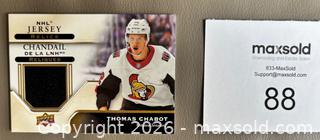 MaxSold Auction: 2019-20 Tim Hortons Thomas Chabot NHL Jersey Relics Card w COA - Ottawa (Ontario, Canada) SELLER MANAGED Downsizing Online Auction - Starwood Road