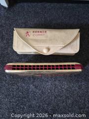MaxSold Auction: Hohner Comet Harmonica with Metal Cover Plates - Langford (British Columbia, Canada) SELLER MANAGED Downsizing Online Auction - Atkins Avenue