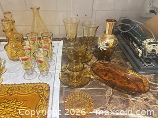 MaxSold Auction: Vintage Mid-Century Amber Glass Tableware Lot - 31 pieces  - Toronto (Ontario, Canada) SELLER MANAGED Downsizing Online Auction - The Kingsway