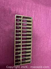 MaxSold Auction: Brass Suanpan Abacus, Small Handheld Chinese Style - Renfrew (Ontario, Canada) SELLER MANAGED Downsizing Online Auction - Plaunt Street South