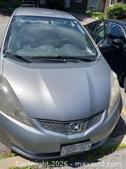 MaxSold Auction: 2009 Honda Fit Hatchback  VIN JHMGE87309S800165 - AS IS - Ottawa (Ontario, Canada) PARTNER MANAGED Downsizing Online Auction - Lassiter Terrace