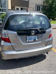 MaxSold Auction: 2009 Honda Fit Hatchback  VIN JHMGE87309S800165 - AS IS - Ottawa (Ontario, Canada) PARTNER MANAGED Downsizing Online Auction - Lassiter Terrace