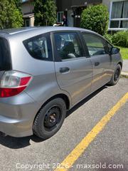 MaxSold Auction: 2009 Honda Fit Hatchback  VIN JHMGE87309S800165 - AS IS - Ottawa (Ontario, Canada) PARTNER MANAGED Downsizing Online Auction - Lassiter Terrace