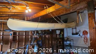 MaxSold Auction: Nova Craft 16 ft Fiberglass Canoe, White with Wood Trim C - Deep River (Ontario, Canada) PARTNER MANAGED Downsizing Online Auction - Frontenac Crescent