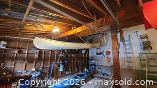 MaxSold Auction: Nova Craft 16 ft Fiberglass Canoe, White with Wood Trim C - Deep River (Ontario, Canada) PARTNER MANAGED Downsizing Online Auction - Frontenac Crescent