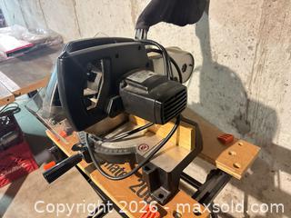 MaxSold Auction: Mitre Saw and Workmate.    C - London (Ontario, Canada) PARTNER MANAGED Estate Sale Online Auction - Brixham Crescent