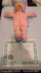 MaxSold Auction: Cabbage Patch Kids Medium Doll with Outfits & Adoption Paperwork - Augusta (Georgia, USA) PARTNER MANAGED Estate Sale Online Auction - Monte Sano Avenue