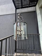 MaxSold Auction: Large 8-Light Foyer Chandelier – Black Metal & Glass Cylinder (Approx. 30”) - Toronto (Ontario, Canada) SELLER MANAGED Estate Sale Online Auction - Danforth Avenue