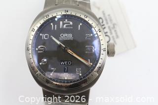 MaxSold Auction: Oris TT3 Titanium Automatic GMT Watch (ref. 7588) - Vaughan (Ontario, Canada) PARTNER MANAGED Reseller Online Auction - Steeles Avenue West Suite