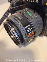 MaxSold Auction: Pentax SF1 35mm SLR with SMC Pentax?F 35-70mm Zoom Lens A - Toronto (Ontario, Canada) Estate Sale Online Auction - Sheppard Avenue East (CONDO)