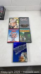 MaxSold Auction: 5 Vintage DVDs, untested - Dundee Township (Illinois, USA) PARTNER MANAGED Reseller Online Auction - Airport Road