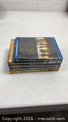 MaxSold Auction: 5 War Movie DVDs, untested - Dundee Township (Illinois, USA) PARTNER MANAGED Reseller Online Auction - Airport Road